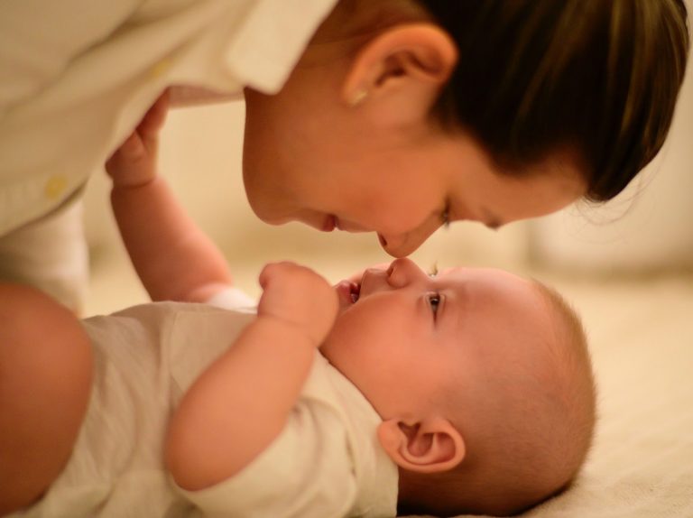 Mother spends time with baby.